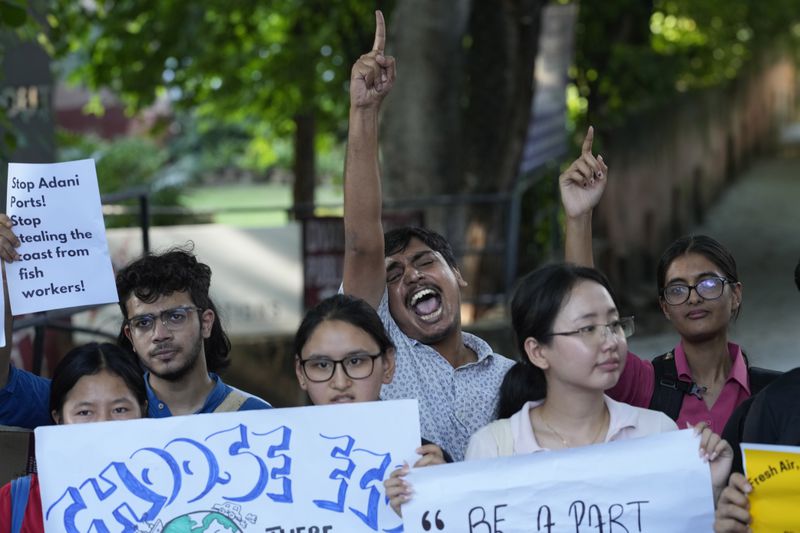 Activists shout slogans during a Global Climate Strike protest of the Fridays For Future' movement demanding immediate climate action from policymakers in New Delhi, India, Friday, Sept. 20, 2024. (AP Photo/Manish Swarup)