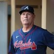 Atlanta Braves manager Brian Snitker (43) watches from the dugout before National League Division Series Wild Card Game Two against the San Diego Padres at Petco Park in San Diego on Wednesday, Oct. 2, 2024.   (Jason Getz / Jason.Getz@ajc.com)