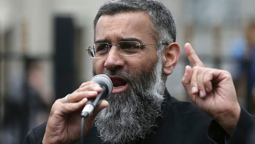 FILE - This is a Friday, April 3, 2015 file photo of Anjem Choudary, a British Muslim social and political activist and spokesman for Islamist group, Islam4UK, speaks following prayers at the Central London Mosque in Regent's Park, London, April 3, 2015. Radical British preacher Anjem Choudary, who was previously convicted of supporting the so-called Islamic State, was found guilty Tuesday by an London jury on terrorism-related charges. (AP Photo/Tim Ireland, File)
