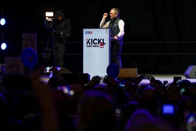 Herbert Kickl, leader of the Freedom Party of Austria, addresses supporters during thefinal rally of his electoral campaign, outside the St. Stephen Cathedral, in Vienna, Austria, Friday, Sept. 27, 2024, ahead of the country's national election which will take place on Sept. 29. (AP Photo/Andreea Alexandru)