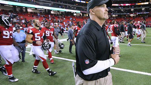 Falcons head coach Dan Quinn finishes the preseason with a 20-19 win over the Ravens taking the field at the end of the game on Thursday, Sept. 3, 2015, in Atlanta. Curtis Compton / ccompton@ajc.com