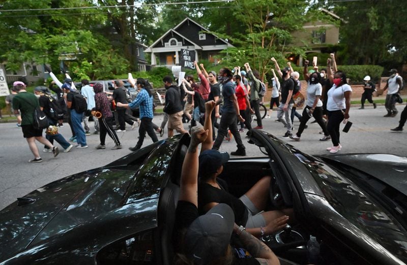 About an hour past curfew, a group made their way through residential neighborhoods in Midtown.