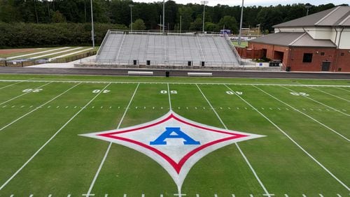 A big “A” logo has been painted on the 50-yard line for a tribute to Apalachee High School ahead of Jefferson High School’s home football game against Stephens County at Jefferson Memorial Stadium, Friday, September 6, 2024, in Jefferson. (Hyosub Shin / AJC)