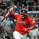 Atlanta Braves shortstop Orlando Arcia reacts after hitting an RBI single to score Austin Riley (27) during the eighth inning at Truist Park on Friday. The Braves won 5-3 over the Miami Marlins. (Hyosub Shin / AJC)