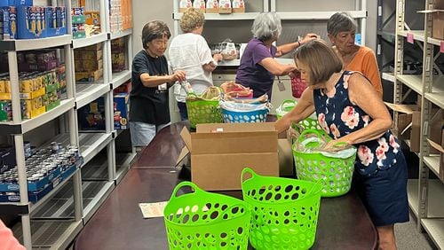 Volunteers from the Assistance League of Atlanta support a variety of causes and needs, including assembling supplies for local elementary schools. Courtesy