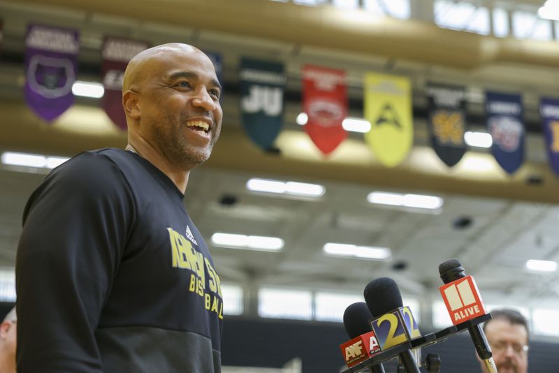 Kennesaw State University men’s basketball coach Amir Abdur-Rahim spoke with reporters at the Convocation Center Wednesday. His team has earned its first-ever trip to the NCAA Division I Tournament. Jason Getz / Jason.Getz@ajc.com)
