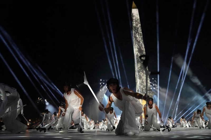 Artists perform during the Opening Ceremony for the 2024 Paralympics, Wednesday, Aug. 28, 2024, at La Concorde square in Paris, France. (AP Photo/Thibault Camus, Pool)