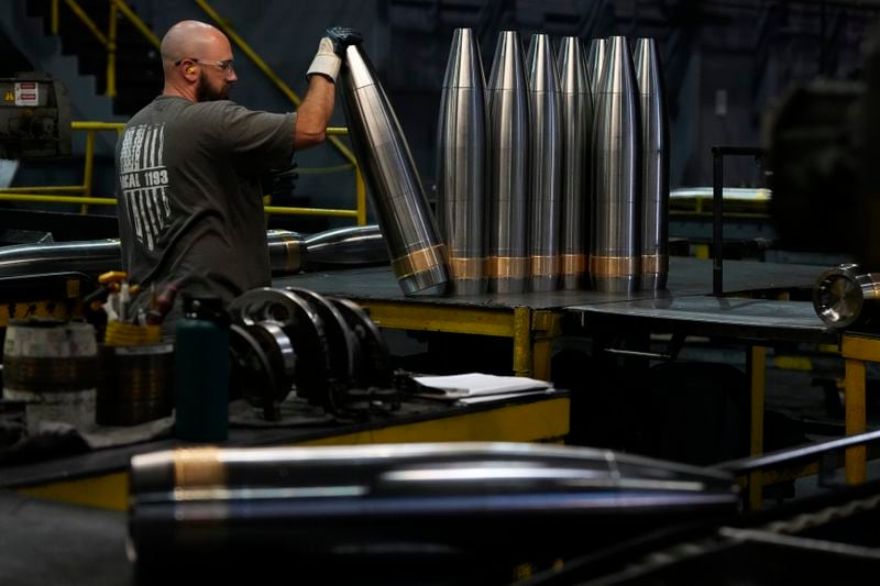 A steel worker manufactures 155 mm M795 artillery projectiles at the Scranton Army Ammunition Plant, Tuesday, Aug. 27, 2024, in Scranton, Pa. (AP Photo/Matt Slocum)