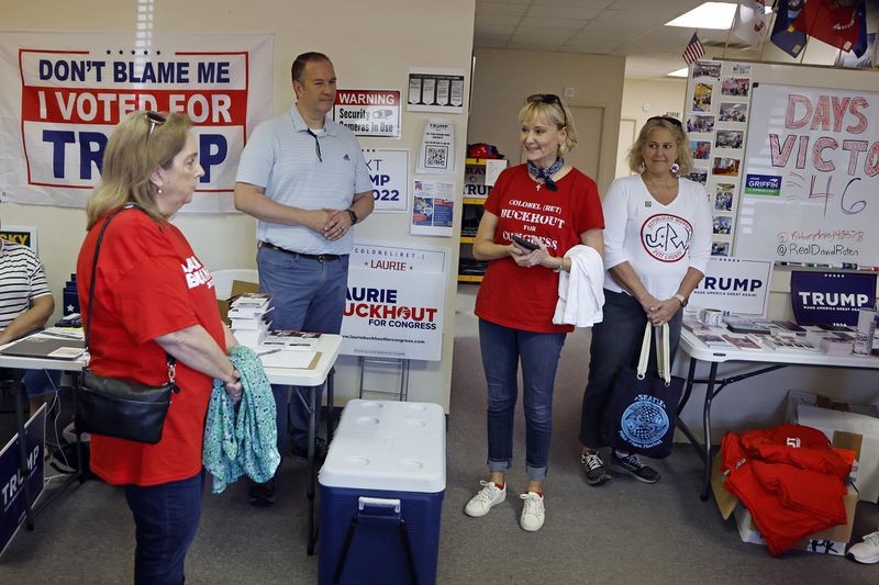 Congressional candidate Laurie Buckhout, R-N.C., second from right, speaks to supporters at the Nash County Republican headquarters in Rocky Mount, N.C., Friday, Sept. 20, 2024. (AP Photo/Karl B DeBlaker)