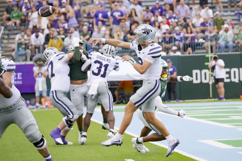 Kansas State quarterback Avery Johnson (2) throws against Tulane during the first half of an NCAA college football game in New Orleans, Saturday, Sept. 7, 2024. (AP Photo/Matthew Hinton)