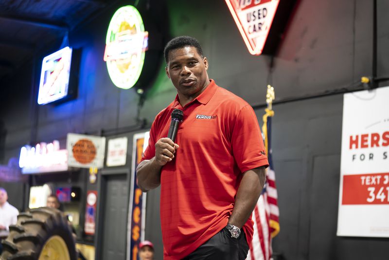 FILE — Herschel Walker speaks at a campaign event in Oscilla, Ga., on July 19, 2022. Herschel Walker, the Republican nominee for U.S. Senate in Georgia and an avowed abortion opponent, paid for his then-girlfriend to have an abortion in 2009, according to a report published Monday in The Daily Beast; Walker called the claim “a flat-out lie.” (Nicole Craine/The New York Times)