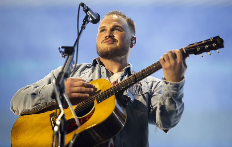 Atlanta, Ga: Zach Bryan played to a sold-out crowd of cowboy hat-clad fans who sang along with every word. Photo taken Saturday August 10, 2024 at Mercedes Benz Sadium. (RYAN FLEISHER FOR THE ATLANTA JOURNAL-CONSTITUTION)