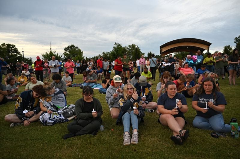 Community members and leaders came together during a community candlelight vigil at Jug Tavern Park on Wednesday, Sept. 4, 2024, in Winder (Hyosub Shin/AJC)