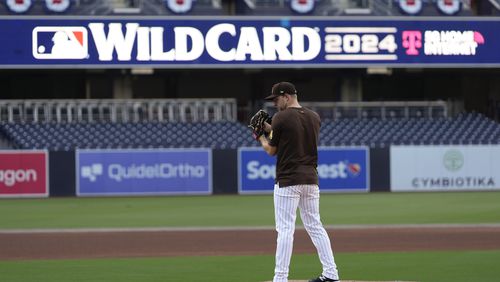 San Diego Padres pitcher Michael King throws during a baseball practice a day before the first game of a National League wild-card baseball series against the Atlanta Braves, Monday, Sept. 30, 2024, in San Diego. (AP Photo/Gregory Bull)