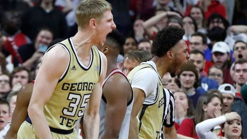 Georgia Tech's James Banks III (right) and Kristian Sjolund (35) celebrate after Banks made a shot while being fouled with one second left against North Carolina State Wednesday, March 6, 2019, in Raleigh, N.C. (AP photo)