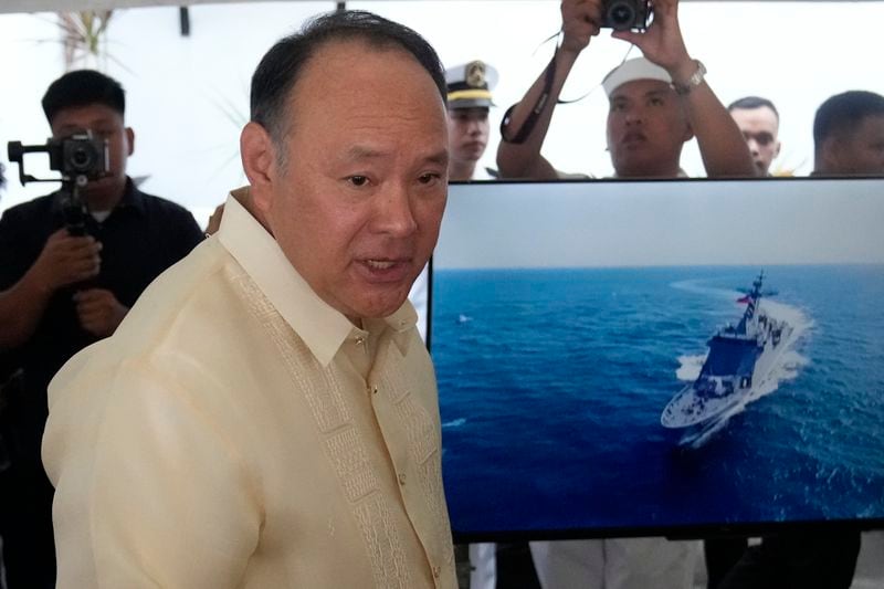 Philippine Defense Secretary Gilberto Teodoro speaks as he arrives during the 126th Philippine Navy anniversary in Manila, Philippines on Friday, May 24, 2024. The Philippines would press efforts to build security alliances and stage realistic combat drills, including joint naval sails with the United States, Japan and Australia in disputed waters, to defend its territorial interests, Defense Secretary Gilberto Teodoro said Friday, dismissing China's criticisms of such moves as a sign of paranoia. (AP Photo/Aaron Favila)