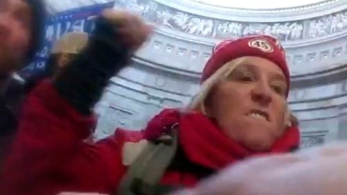 This image from U.S. Capitol Police body-worn video that was in the government sentencing memorandum in the case, shows Jacquelyn Starer, a physician from Massachusetts, striking a police officer in the Rotunda of the U.S. Capitol on Jan. 6, 2021, in Washington. (U.S. Capitol Police via AP)