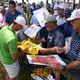 Rory McIlroy signs autographs for fans behind the ninth green during the practice rounds for the Tour Championship at East Lake Golf Club, on Wednesday, Aug. 28, 2024, in Atlanta. Wednesday was the first day the public was allowed on the course. (Jason Getz / AJC)
