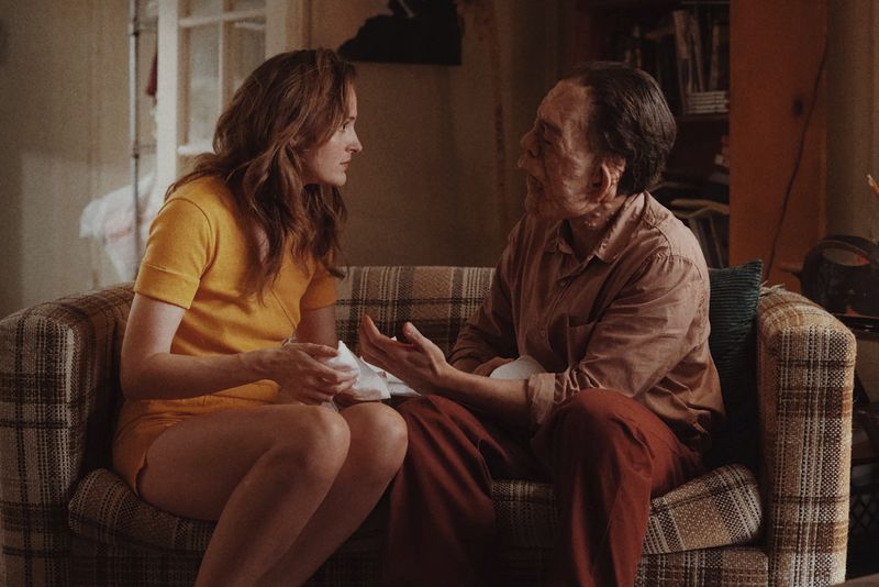 This image released by A24 shows Renate Reinsve, left, and Adam Pearson in a scene from "A Different Man." (Matt Infante/A24 via AP)