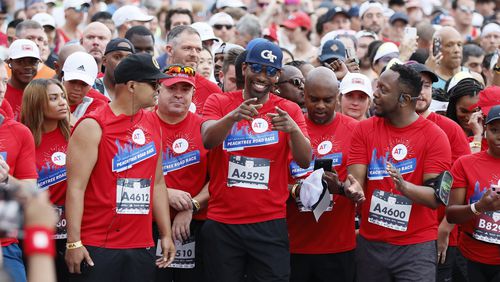 Atlanta Mayor Andre Dickens reacts moments before he takes off at the start of the 54th running of the Atlanta Journal-Constitution Peachtree Road Race in Atlanta on Tuesday, July 4, 2023.



Miguel Martinez /miguel.martinezjimenez@ajc.com