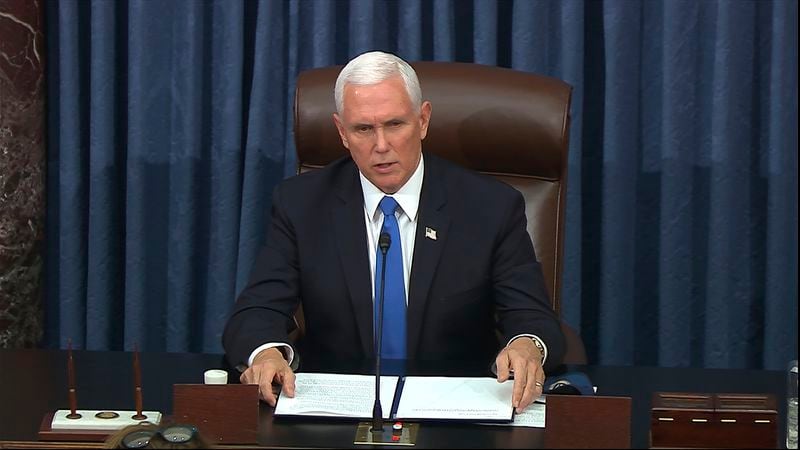 In this image from video, Vice President Mike Pence speaks as the Senate reconvenes after protesters stormed into the U.S. Capitol Wednesday, Jan. 6, 2021. (Senate Television via AP)