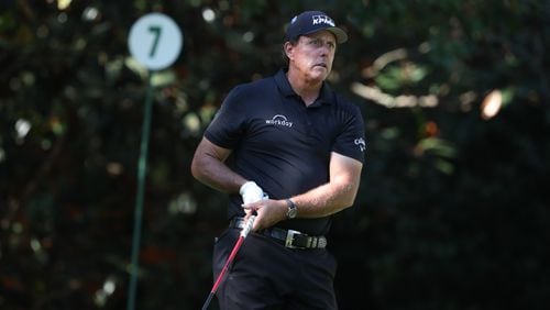 Phil Mickelson tees off on the 7th hole during the second round of the Masters Friday at Augusta National.(Curtis Compton/Atlanta Journal-Constitution/TNS) 