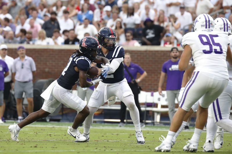 Mississippi quarterback Jaxson Dart ( 2) passes the ball during the first half of an NCAA college football game against Furman, Saturday, Aug. 31, 2024, in Oxford, Miss. (AP Photo/Sarah Warnock)