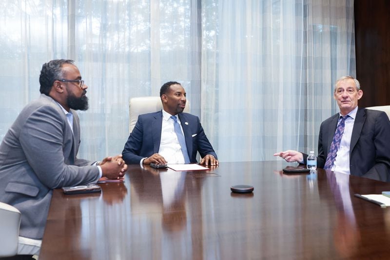 (Left to right) City of Atlanta Chief Financial Officer Mohamed Balla, Mayor Andre Dickens, and Atlanta City Council member Howard Shook discuss the city’s bond rating at Atlanta City Hall on Thursday, Sept. 12, 2024. (Natrice Miller/ AJC)