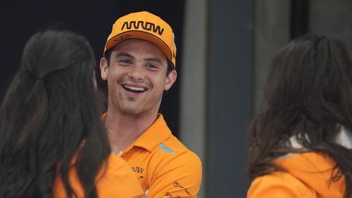 FILE - Pato O'Ward, of Mexico, talks with staff members before the Indianapolis 500 auto race at Indianapolis Motor Speedway, Sunday, May 26, 2024, in Indianapolis. (AP Photo/Darron Cummings, File)