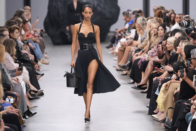 A model walks the runway during the Michael Kors Collection spring/summer 2025 fashion show as part of New York Fashion Week, Tuesday, Sept. 10, 2024, in New York. (AP Photo/Pamela Smith)