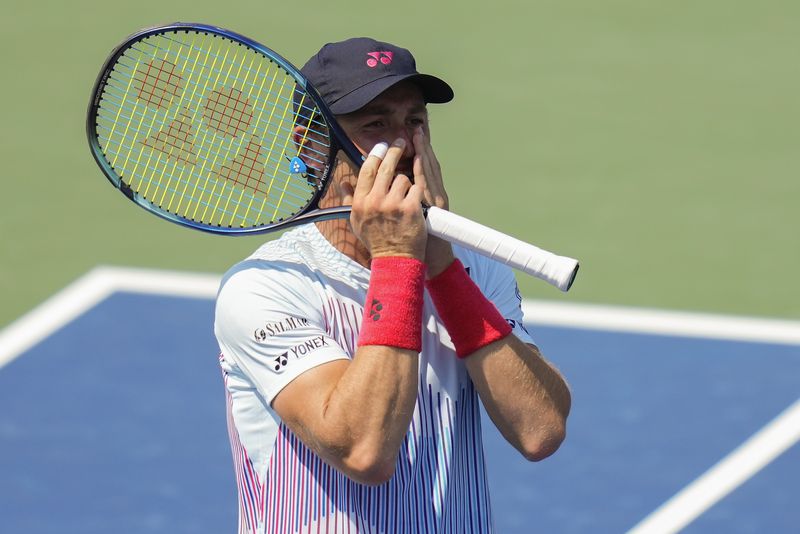 Casper Ruud, of Norway, reacts after a shot to Bu Yunchaokete, of China, during the first round of the U.S. Open tennis championships, Monday, Aug. 26, 2024, in New York. (AP Photo/Kirsty Wigglesworth)