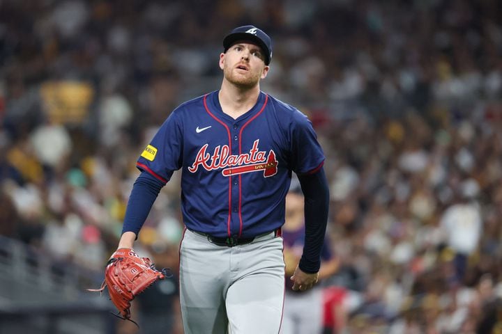 Atlanta Braves pitcher Aaron Bummer (49) reacts after ending the fourth inning against the San Diego Padres of National League Division Series Wild Card Game One at Petco Park in San Diego on Tuesday, Oct. 1, 2024.   (Jason Getz / Jason.Getz@ajc.com)