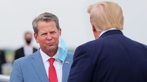 Gov. Brian Kemp, left, has tried to ease tensions between himself and former President Donald Trump since winning reelection in 2022. But Trump, who blames Kemp for not doing enough to reverse his election defeat in 2020, stirred up the fight again during his rally Saturday in Atlanta. During a press conference Thursday, Trump said he hopes the two can fix their rocky relationship, “but if we don’t, the people are still the people and they’re going to vote.” (Curtis Compton/Atlanta Journal-Constitution/TNS)