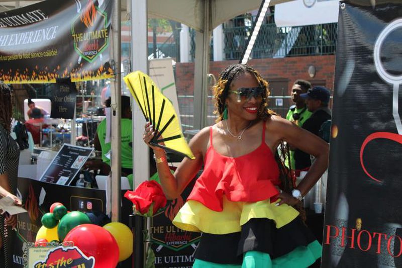 Jessica Shurn, of Atlanta, runs the Photoboss 360 ATL photobooth at the 21st Annual Juneteenth Celebration in Marietta on Saturday. (Photo Courtesy of Isabelle Manders)
