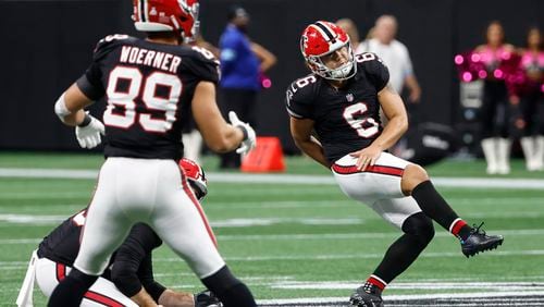 Atlanta Falcons place kicker Younghoe Koo, of South Korea, kicks a game winning 58-yard field goal against the New Orleans Saints during the second half of an NFL football game, Sunday, Sept. 29, 2024, in Atlanta. (AP Photo/Butch Dill)