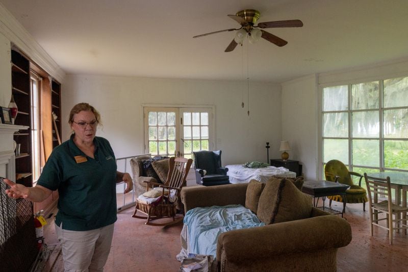 Elizabeth DuBose shows the inside of the Little Torrey House on Friday, June 28, 2024 on Ossabaw Island. (AJC Photo/Katelyn Myrick)