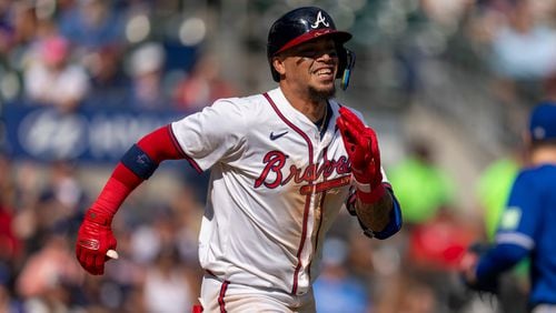 Atlanta Braves' Orlando Arcia runs toward first base during the 10th inning of a baseball game against the Toronto Blue Jays, Sunday, Sept. 8, 2024, in Atlanta. (AP Photo/Erik Rank)