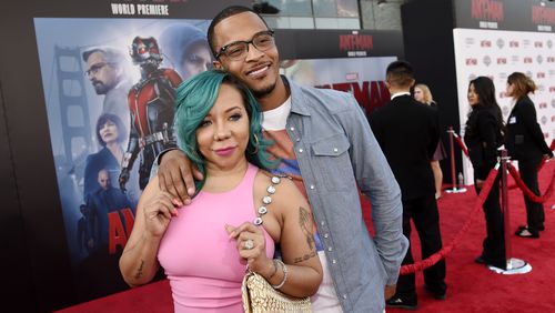 Rapper Clifford "T.I." Harris, a cast member of "Ant-Man," poses with his wife, Tameka “Tiny” Cottle-Harris, at the premiere of the film in 2015 in Los Angeles. (Photo by Chris Pizzello/Invision/AP)