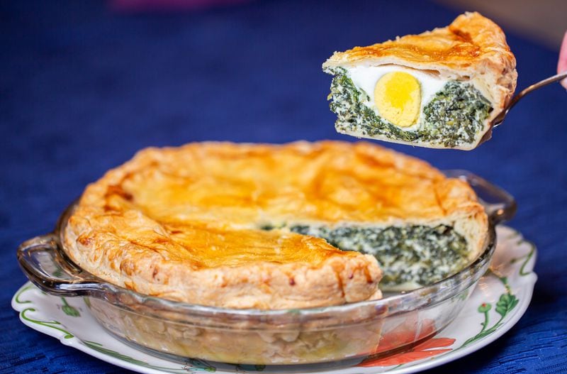 Torta Pasqualina (Easter Pie) featuring spinach, ricotta and hard-boiled eggs. Styling by Cynthia Graubart. (RYAN FLEISHER FOR THE ATLANTA JOURNAL-CONSTITUTION)