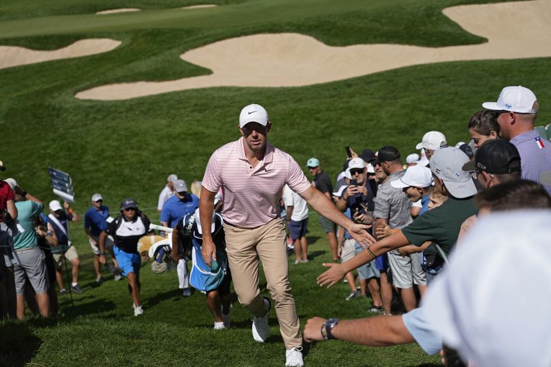 Rory McIlroy, of Northern Ireland, walks to the second tee during the third round of the BMW Championship golf event at Castle Pines Golf Club, Saturday, Aug. 24, 2024, in Castle Rock, Colo. (AP Photo/Matt York)