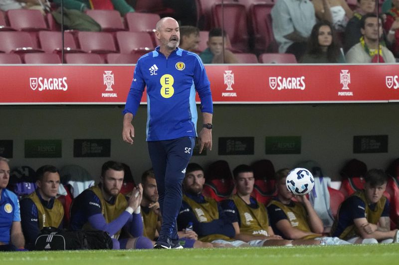 Scotland's head coach Steve Clarke reacts during the UEFA Nations League soccer match between Portugal and Scotland at the Luz stadium in Lisbon, Portugal, Sunday, Sept. 8, 2024. (AP Photo/Armando Franca)