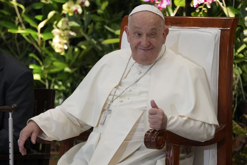 Pope Francis gestures as he interacts with the young people of Scholas Occurrentes at Grha Pemuda Youth Center in Jakarta, Indonesia, Wednesday, Sept. 4, 2024. (AP Photo/Tatan Syuflana, Pool)