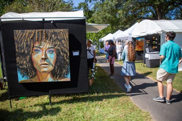 People walk by the artists' booths during the Festival on Ponce on Sunday, October 10, 2021. Presented by the Atlanta Foundation for Public Spaces, the fest in Olmsted Linear Park returns Oct. 5-6, 2024. (Photo: Steve Schaefer for The Atlanta Journal-Constitution)