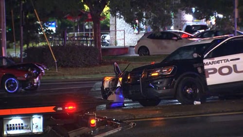 The crash happened on Cobb Parkway near the Roswell Road intersection.