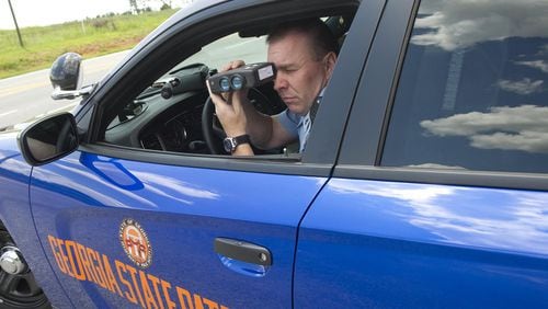 After facing a third sexual harassment complaint, Georgia State Patrol Trooper Chris Niehus was fired this year, in large part because of new standards under Gov. Brian Kemp’s sexual harassment policy. Niehus is seen here checking traffic speeds in 2014. JIM BLAYLOCK / THE AUGUSTA CHRONICLE