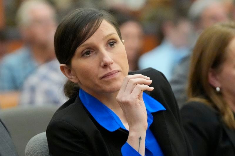 Kouri Richins, a Utah mother of three who wrote a children's book about coping with grief after her husband's death and was later accused of fatally poisoning him, looks on during a courthearing Tuesday, Aug. 27, 2024, in Park City, Utah. (AP Photo/Rick Bowmer, Pool)