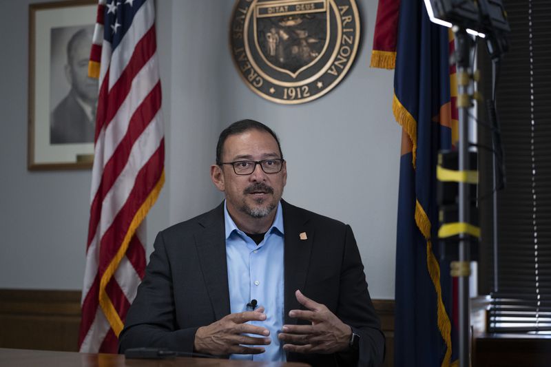 FILE - Arizona Secretary of State Adrian Fontes, a Democrat, speaks during an interview with the Associated Press in Arizona, Monday, March 4, 2024. (AP Photo/Serkan Gurbuz, File)