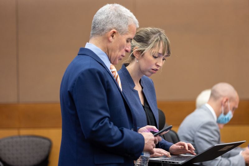 (L-R) Defense attorney Brian Steel and prosecutor Lizzie Rosenwasser speak before a hearing for Atlanta rapper Young Thug, whose real name is Jeffery Williams, at the Fulton County Courthouse in Atlanta on Thursday, December 15, 2022. Williams was indicted in a RICO case earlier this year. (Arvin Temkar / arvin.temkar@ajc.com)