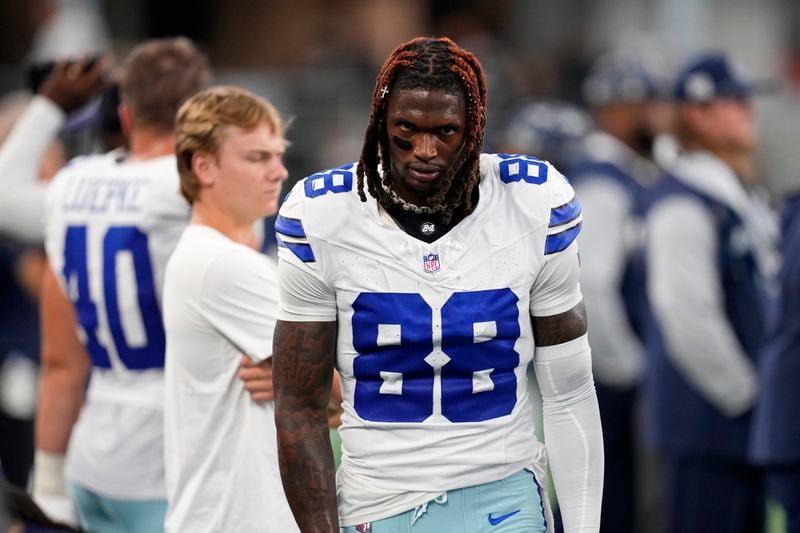 Dallas Cowboys wide receiver CeeDee Lamb walks on the team's sideline in the first half of an NFL football game against the Baltimore Ravens in Arlington, Texas, Sunday, Sept. 22, 2024. (AP Photo/Jeffrey McWhorter)