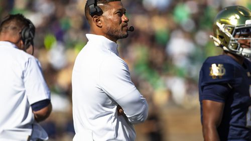 Notre Dame head coach Marcus Freeman looks to the scoreboard during an NCAA college football game against Northern Illinois, Saturday, Sept. 7, 2024, in South Bend, Ind. (AP Photo/Michael Caterina)